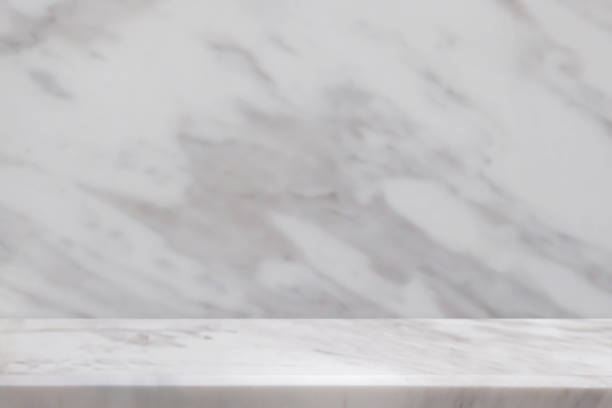istock white marble table top with natural wall texture background for mockup product display template 1512396194