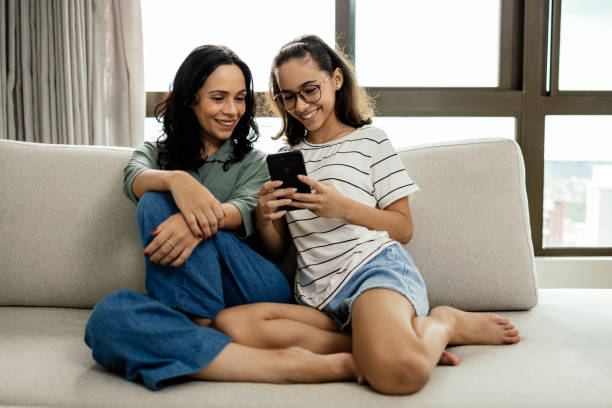istock Single parenthood. Mother and daughter spending time together at home. 1512454246