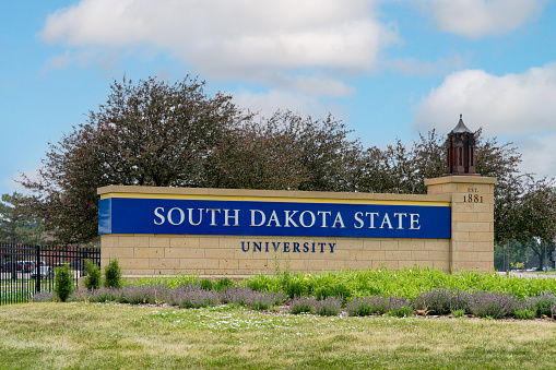 Brookings, SD, USA - June 21, 2023: Entrance wall to the campus of South Dakota State University.