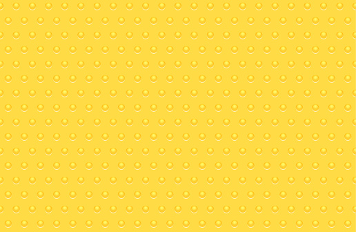 Seamless textured yellow raised dots vector pattern background illustration