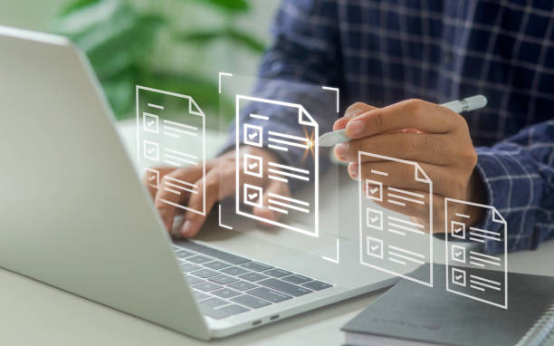 istock usiness people checking surveys Check the boxes and complete online forms or answer questions. concept of customer experience and satisfaction 1512792871