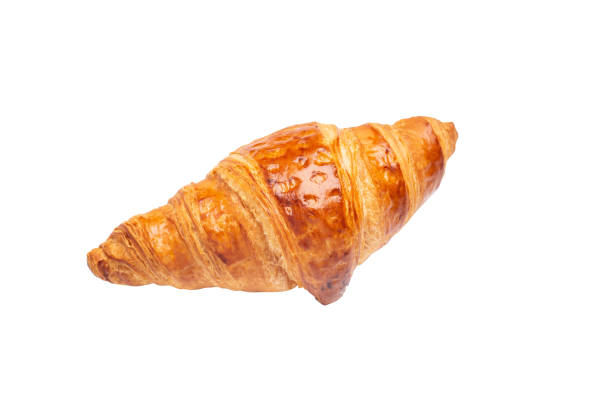 istock Delicious fresh croissant isolated on white background 1512808927