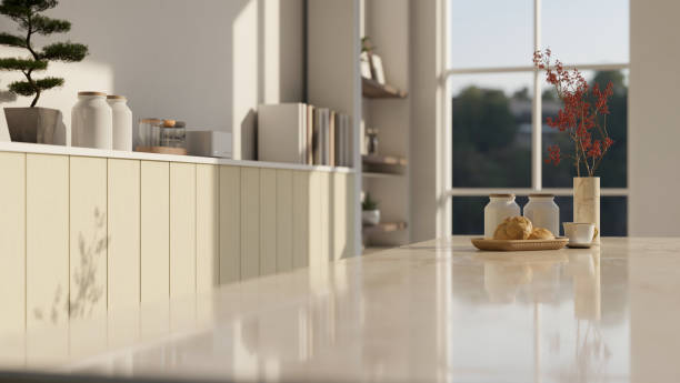istock Empty space on a luxury white marble kitchen tabletop in a modern bright kitchen. 1512832860