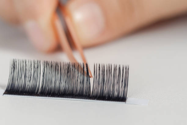 Factory for the production of false eyelashes, workers are making eyelashes