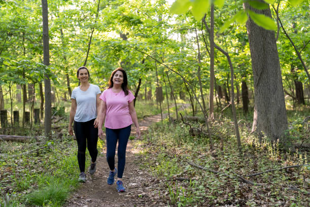 istock Two mature latin women hiking 1512882178