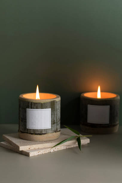 istock Scented candles made of bamboo, indoor tabletop background 1512884418