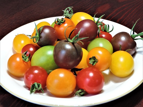 Multi-colored mini tomatoes. Nice and tasty.