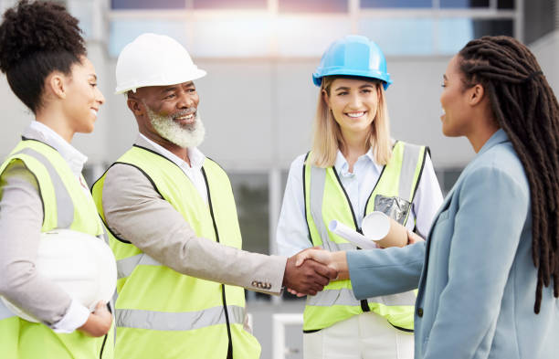 istock Handshake, architecture and collaboration with people on construction site for planning, engineering and deal. Designer, building and contract with contractors for teamwork, welcome and industry 1512945176