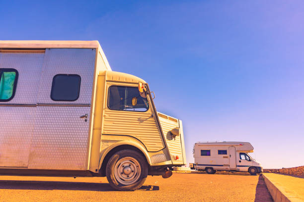 istock Vintage caravan camping on coast 1513050032