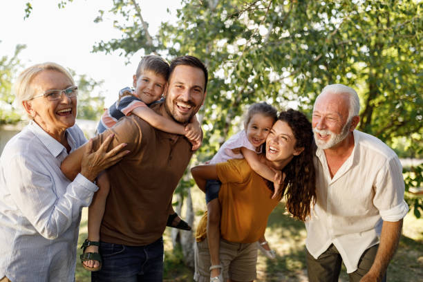 istock Cheerful extended family having fun in nature. 1513089723