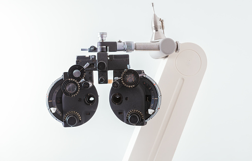 Close up of Phoropter of ophthalmology. optometry and optician clinical testing machine equipment. Phoropter on isolated background