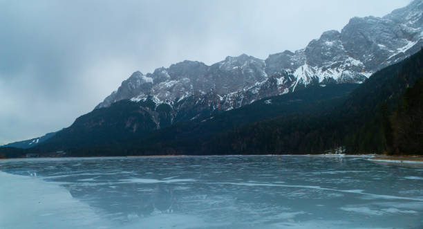 istock Frozen Lake Eibsee Germany with reflection in it 1513154223