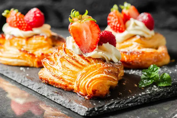Delicious flaky fresh baked Danish Pastry with Chantilly cream and fresh fruit.