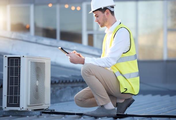 istock Man, engineer and tablet on roof for air conditioning maintenance, tech and digital analysis. Technician, mobile touchscreen and rooftop for ac repair for building, industry and development in city 1513191956