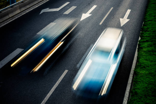 istock car driving on city road, high angle view, beijing china 1513210946
