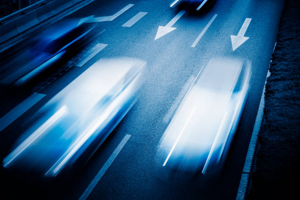 istock car driving on city road, high angle view, beijing china 1513210965