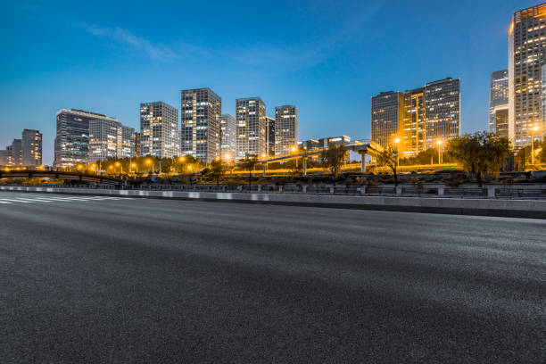 istock Empty asphalt road through modern city in beijing, China 1513211519