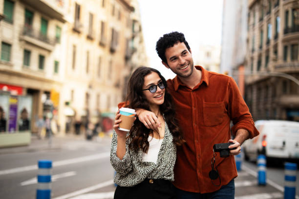istock Traveling couple taking photos with camera. 1513273171