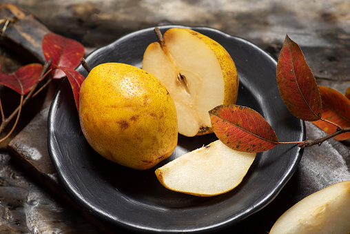 bunch of apples and pears on a white background