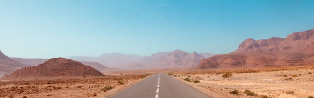 istock Road on a desert- Morocco 1513317090