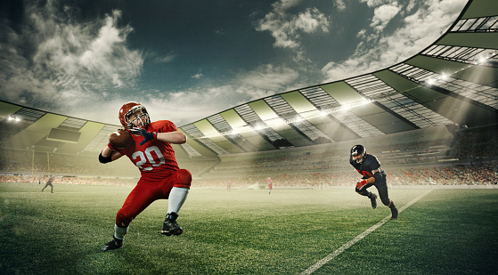 Dynamic image of sportsmen, american football players in uniform, in motion during game running at 3D stadium with ball. Concept of professional sport, competition, match, action, energy, hobby, ad