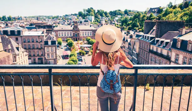 Woman looking at panoramic view of Morlaix city skyline- Finistere,  France