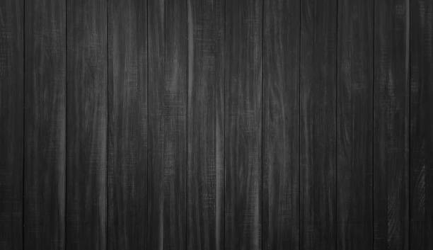 istock dark black timber texture in vertical planks pattern. rustic style wallpaper. close up of wall made of grey walnut wooden planks. 1513328634