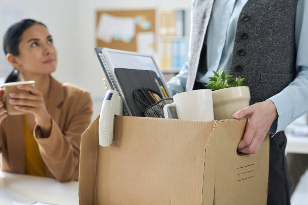 istock Businesswoman packing her things for move 1513365599