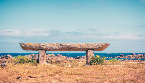 istock Stone bench in pink granite rock coast- Brittany 1513381685