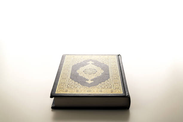 istock The Holy Al Quran with written Arabic calligraphy 1513386956