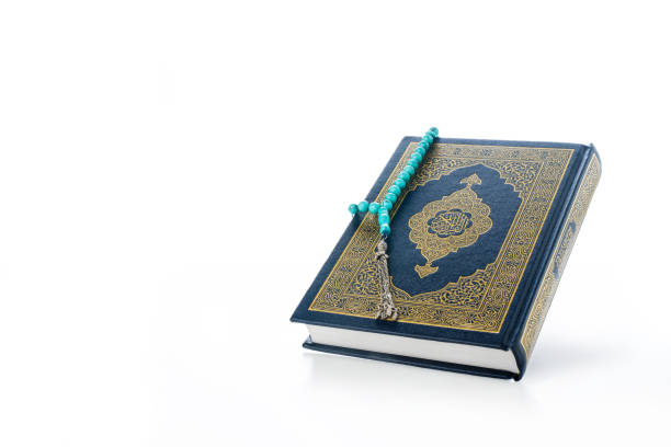 istock The Holy Al Quran with written Arabic calligraphy 1513386979