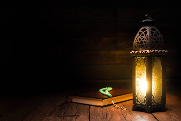 istock The Holy Al Quran with written Arabic calligraphy 1513387490