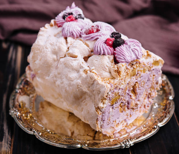 istock Meringue roll cake with cream and berries 1513401468