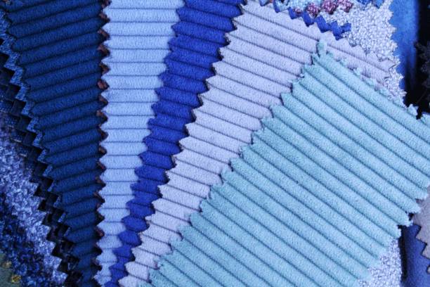 istock Close-up of colorful upholstery fabric samples. Textile texture background 1513406823