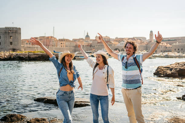 istock Three Young Friends Dancing In Dubrovnik Bay 1513459916
