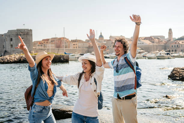 istock Three Young Friends Dancing In Dubrovnik Bay 1513463157