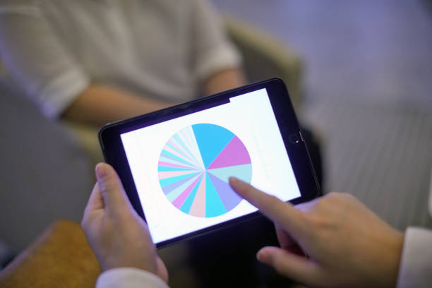 istock Closeup of tablet in businessman's hand 1513464259