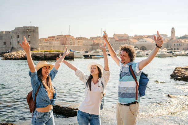 istock Three Young Friends Dancing In Dubrovnik Bay 1513465359