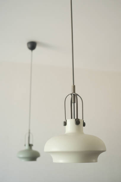 istock gray ceiling lamp hanging in a room , 1513486765