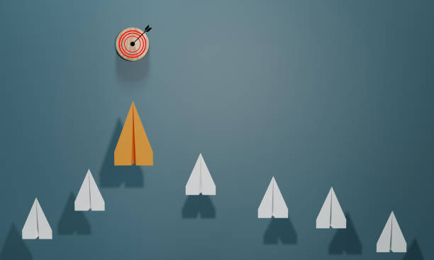 istock Leadership concept with orage paper plane leading among white on blue background. 1513489989