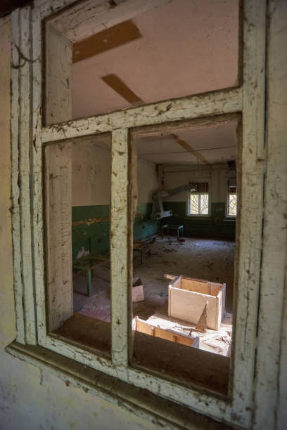 istock abandoned house overgrown with wild plants 1513491574