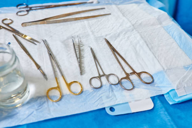 istock Scissors surgical with torundas in an operating theater 1513492715