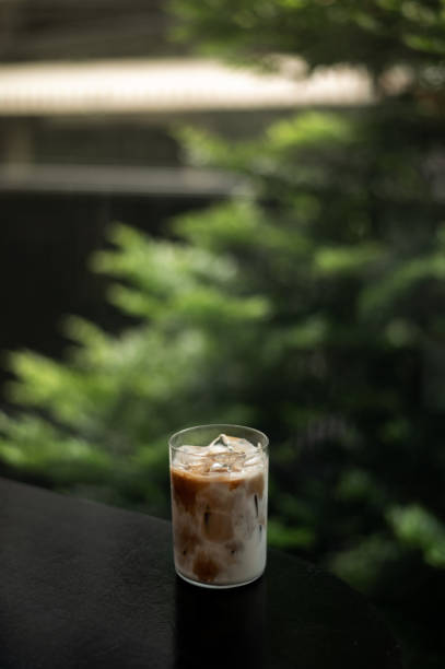 istock Glass of coffee on the table 1513494811