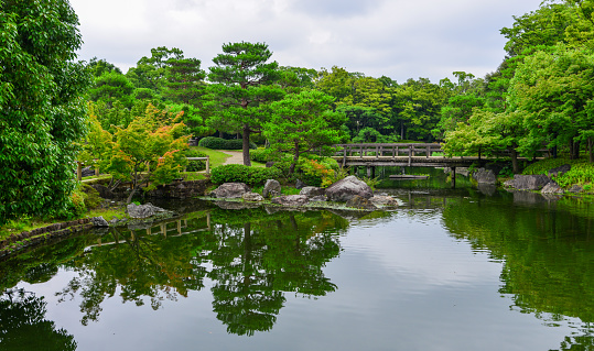 Idyllic landscape of Nakamura Public Park at summer day, Nagoya City, Japan.