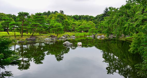Idyllic landscape of Nakamura Public Park at summer day, Nagoya City, Japan.