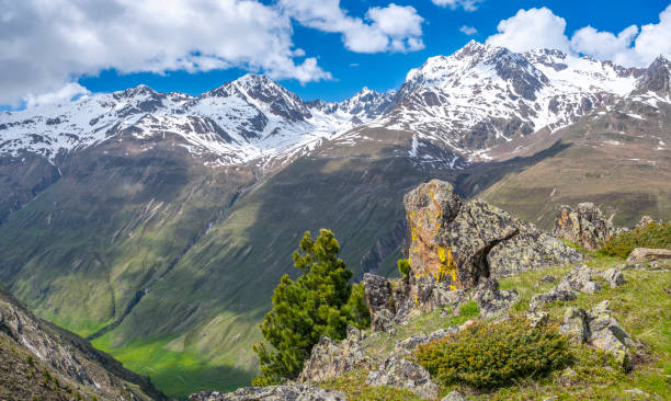 View on the Wildspitze mountain peak from the opposite side of the Venter valley in the tiroler Alps during a beautiful springtime day. The Wildspitze is the highest mountain in the Ötztal Alps and the second highest mountain in Austria after the Großglockner.