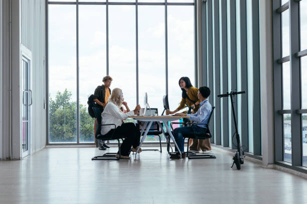 istock Young people work in modern office. stock photo 1513535616