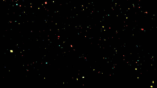 istock Colorful confetti on black background. Decorative elements for various festivals and events. 1513541609
