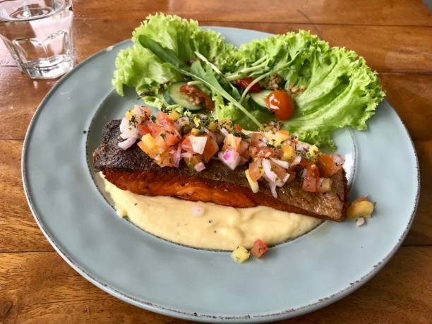 istock Grilled salmon with tomato salsa & mashed potato 1513560007