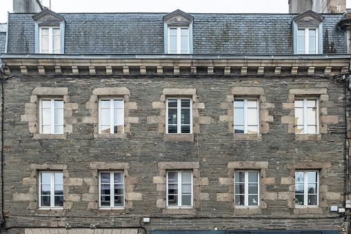 Morlaix, Brittany, France - 2022 August 21: Traditional French facade of a town house located in Morlaix, Typical houses of French Brittany